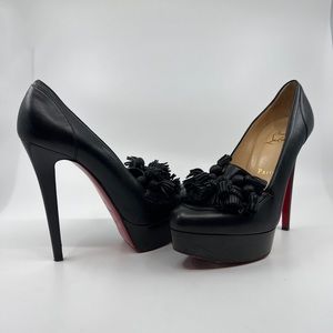 Christian Louboutin tassel pumps